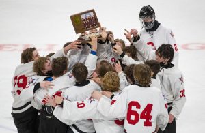 Gentry Academy players raised their trophy after winning the boy's hockey Class A state championship 8-1 over Dodge County.    ]

ALEX KORMANN • alex.kormann@startribune.com



Dodge County took on Gentry Academy in the boy's hockey Class A state championship on Saturday, April 3, 2021 in Xcel Energy Arena in St. Paul.