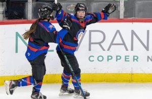 Gentry Academy forwards Alexa Hanrahan (5) and Grace Delmonico (22) celebrate after Delmonico scored a goal against Andover in the second period of the Class 2A girl’s hockey championship Saturday, Feb. 25, 2023 at Xcel Energy Arena in St. Paul.   ]

ALEX KORMANN • alex.kormann@startribune.com